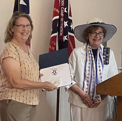 Sherrie Archer and Pat Thibodeau were among the attendees of the Captain James Burleson Chapter, US Daughters of 1812, and the James Pinckney Henderson Chapter, Daughters of the Republic of Texas, meeting held in Canton July 23. Courtesy photo