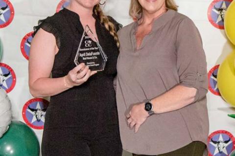 April DelaFuente of Mad House &amp; Co., left, was named as the winner of the Canton Main Street’s ‘Downtowner of the Year’ April 19 during the annual Canton Texas Chamber of Commerce Gala at the Canton Civic Center. Presenting the award was Canton Main Street Director Shelley Newton.